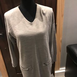 Long grey sweater with 2 zipper details.